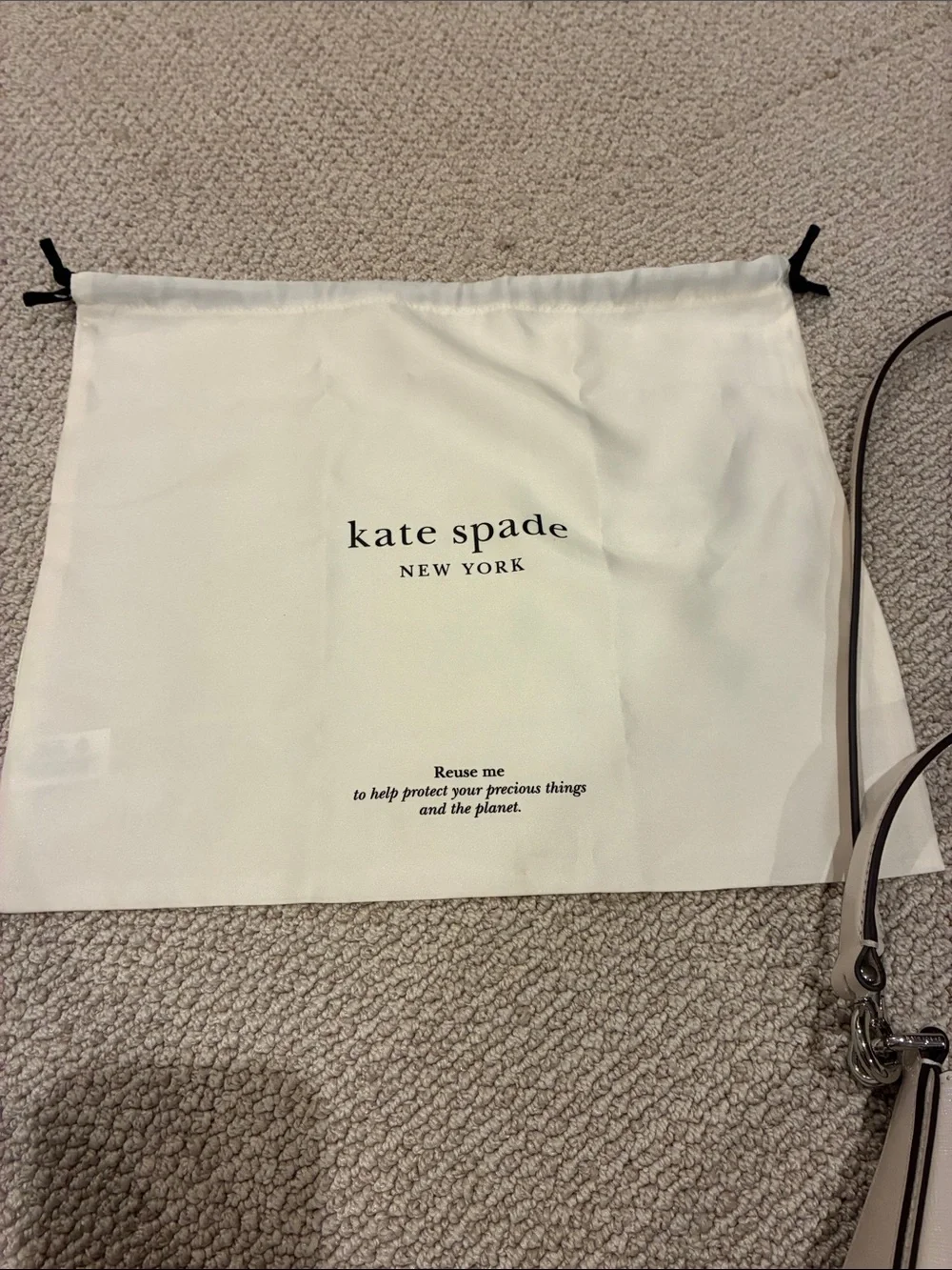 kate spade Cream Pebbled Leather Mini Shoulder bag.